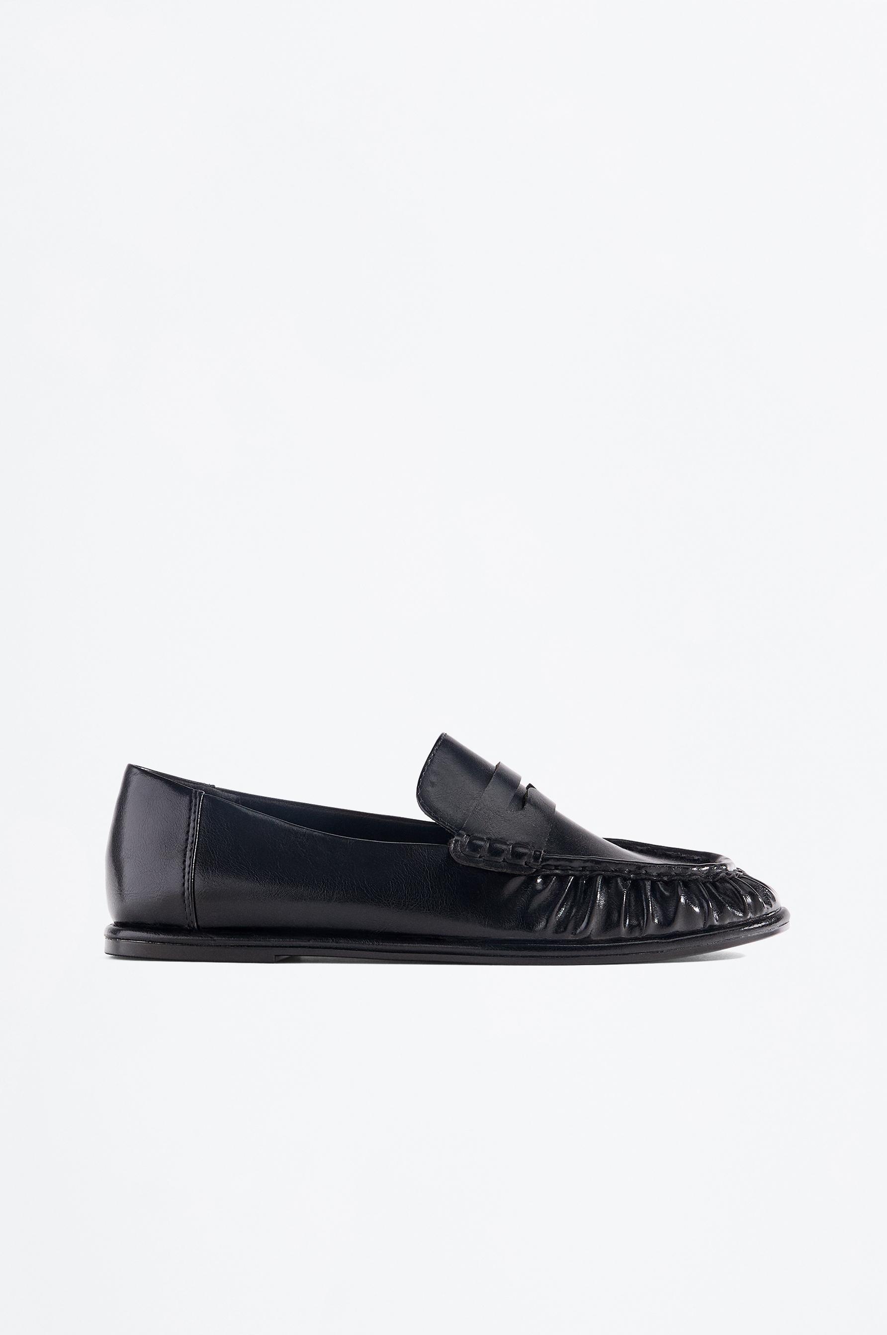 Mocasín fruncido