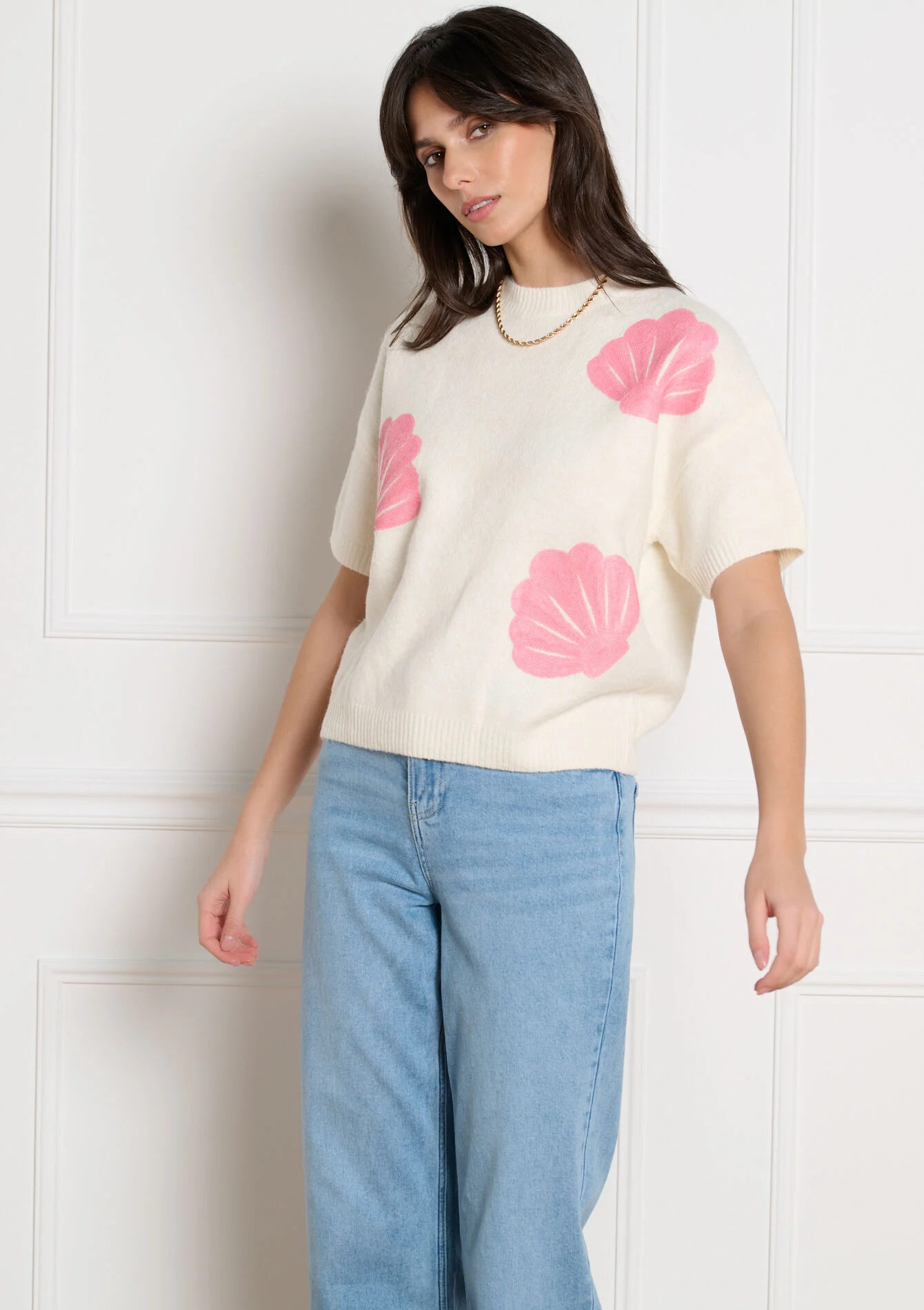 Trui met schelpen en pailletten