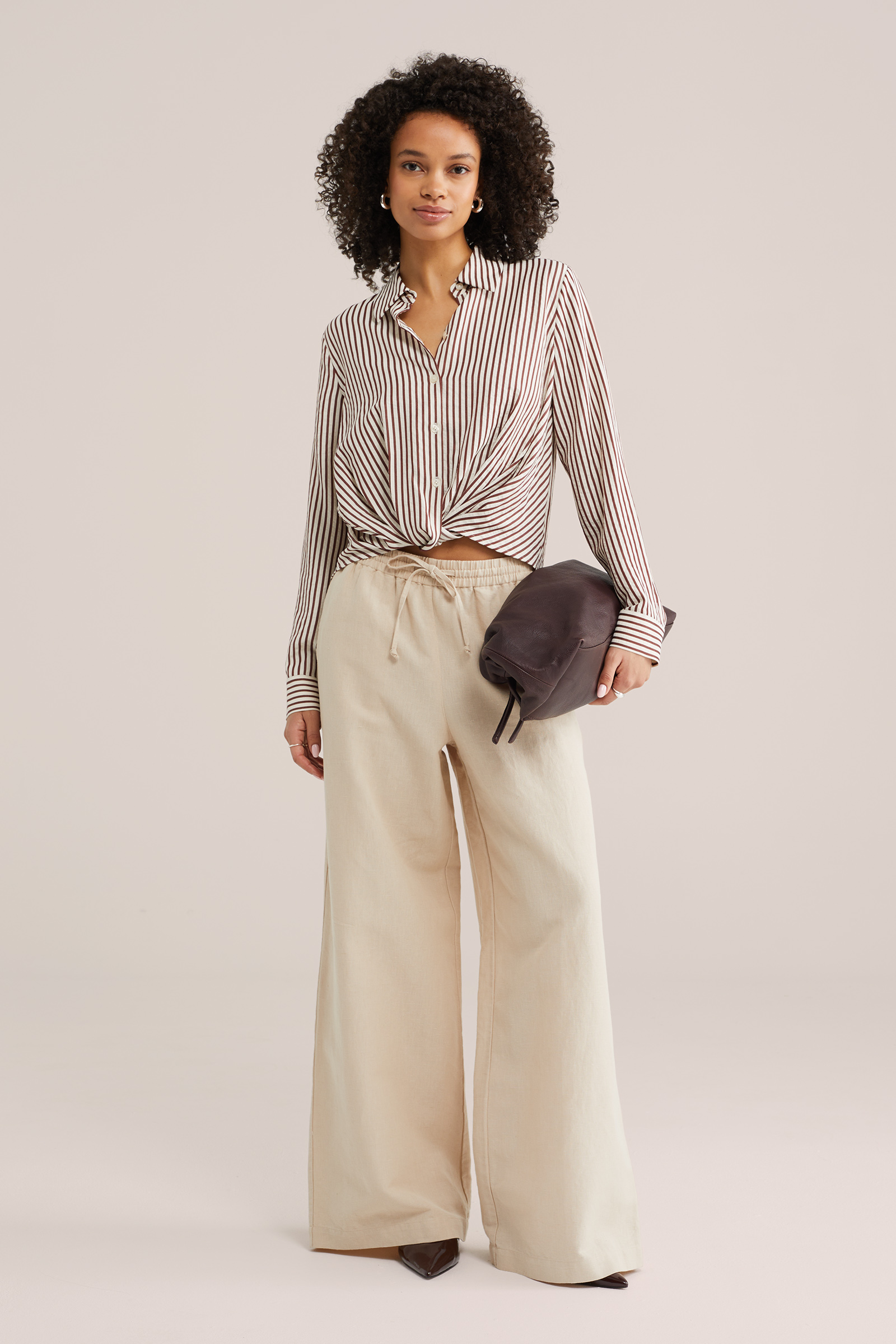 Dames seersucker blouse met knoopdetail