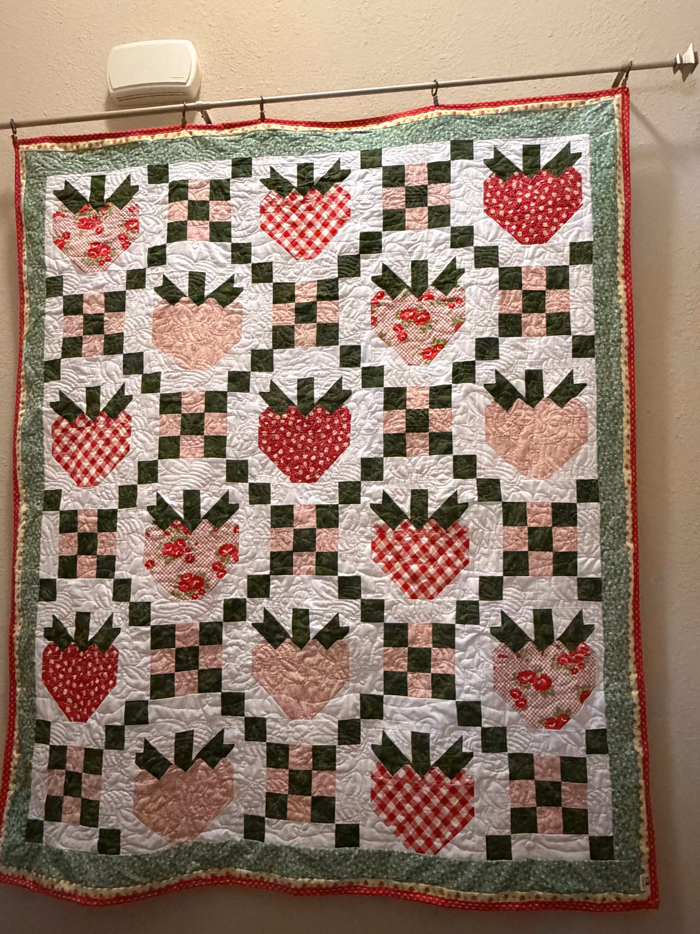 Irish chain strawberries, Hand made by me, machine sewn quilt. Made with 100% new cotton materials. measures 65x54 inches inches