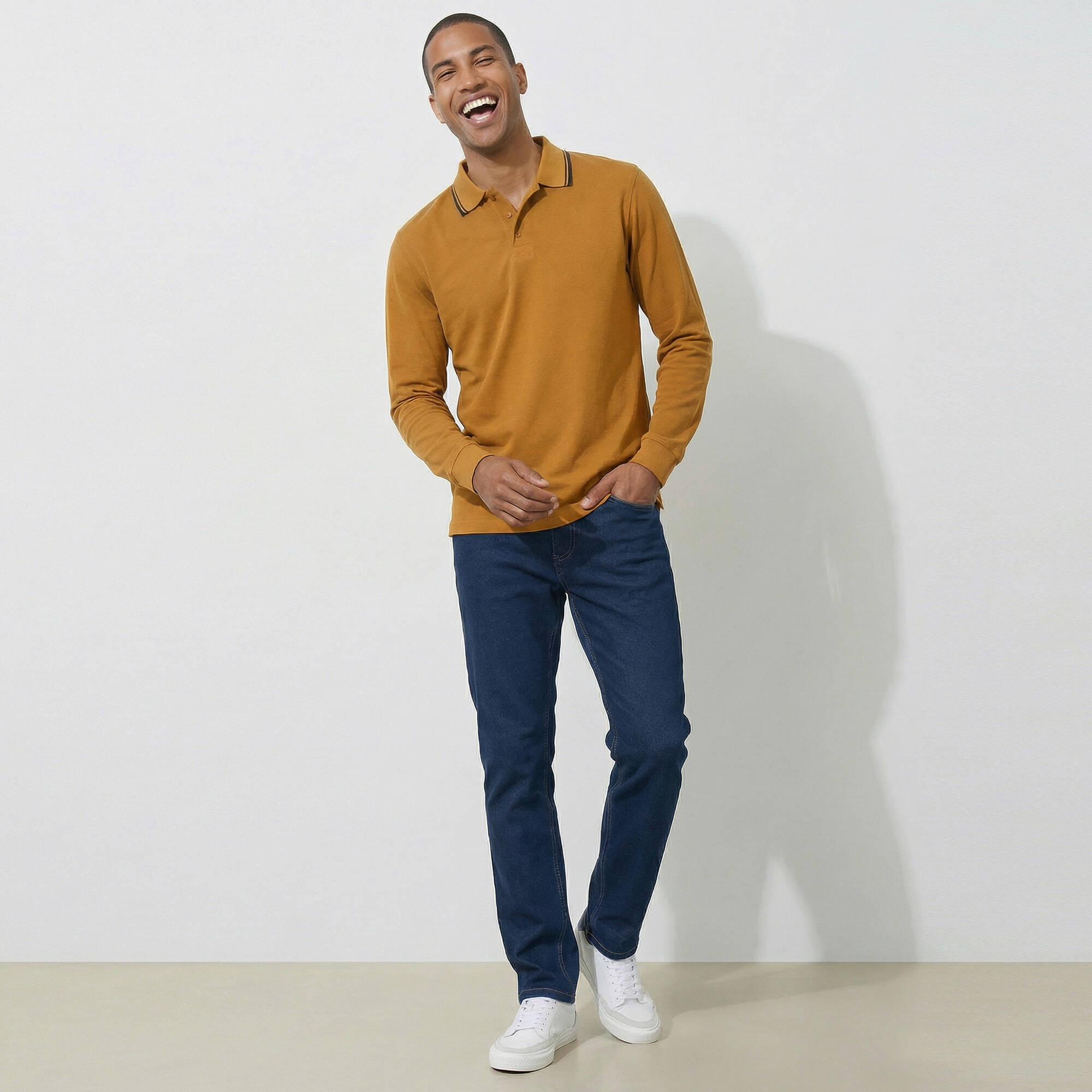 Polo uni maille piquée manches longues