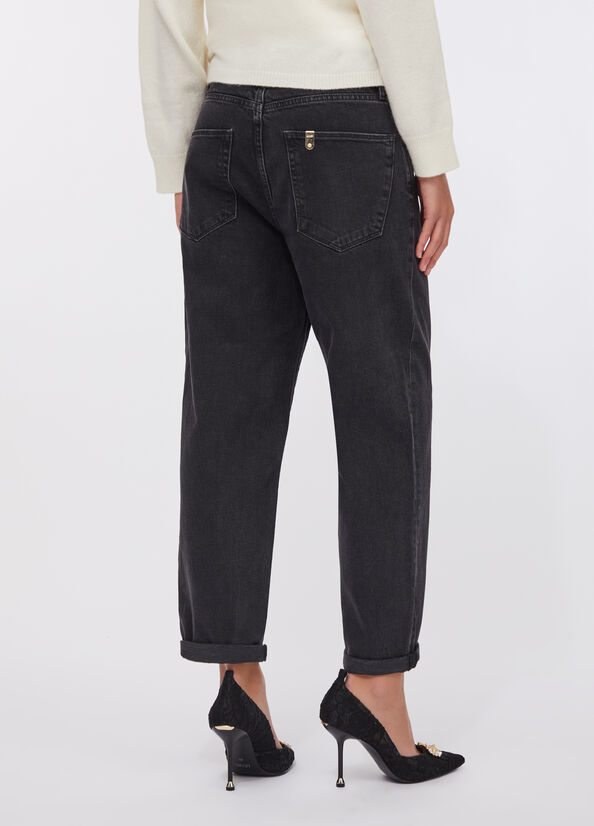 Jeans boyfriend con tasca matelass&eacute;