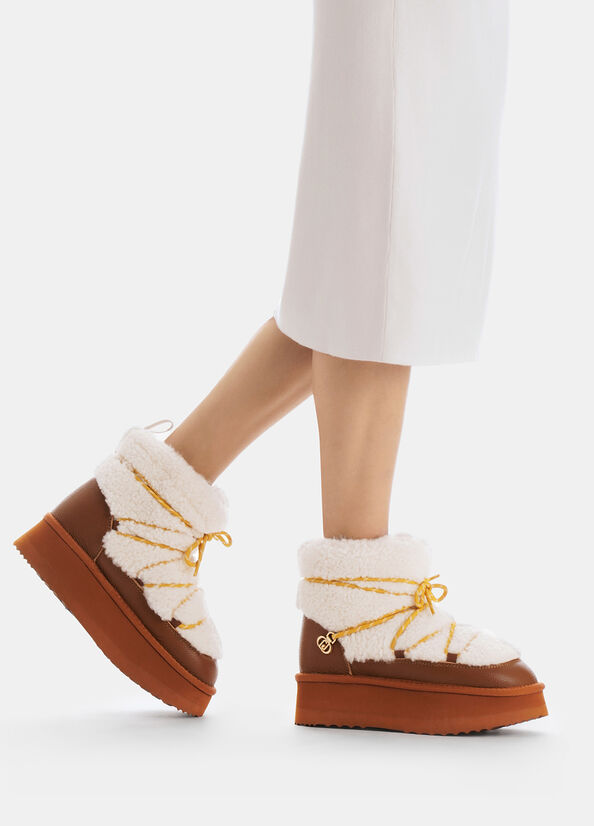 Stivaletti warm stringati