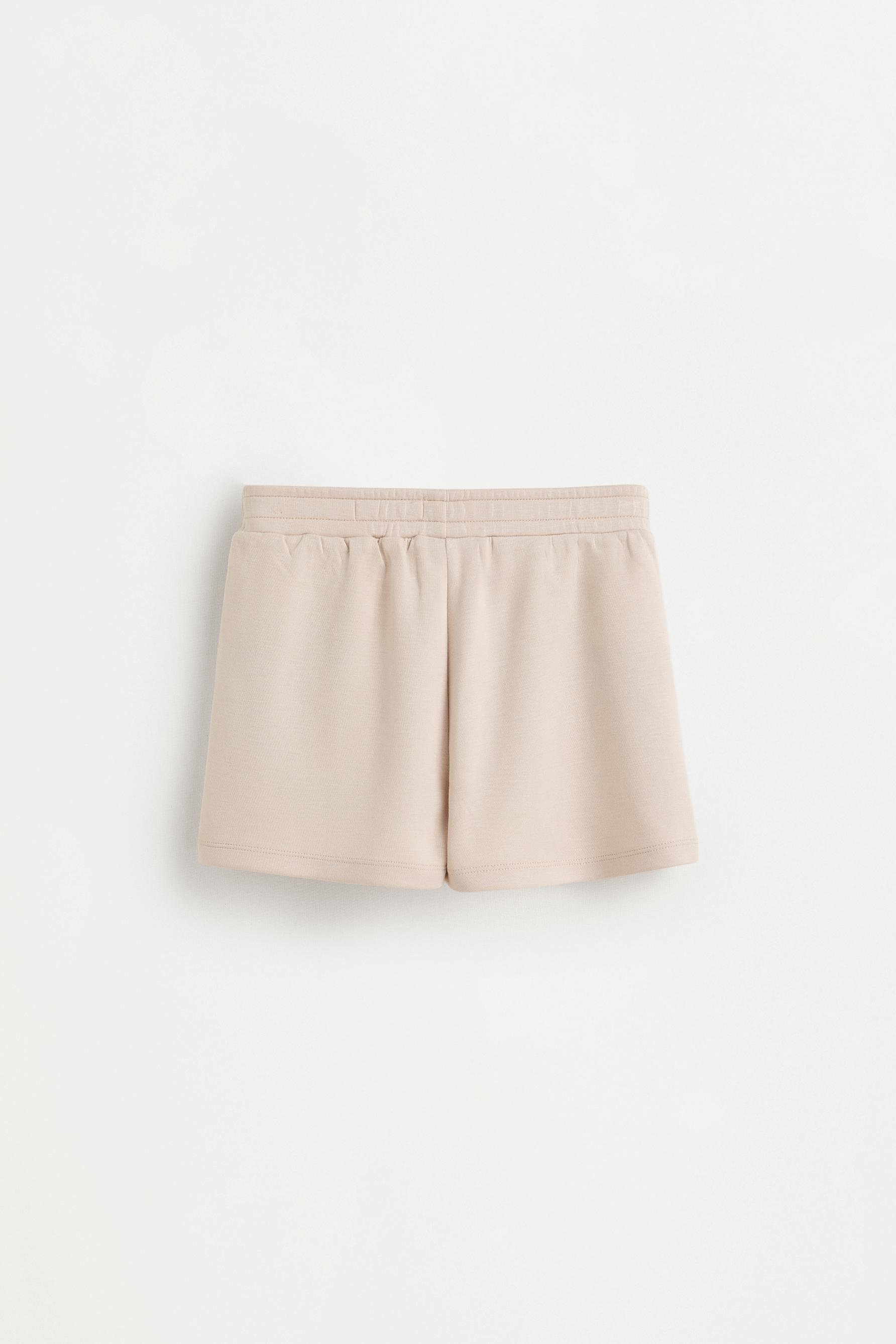 Short felpa fluida pinzas