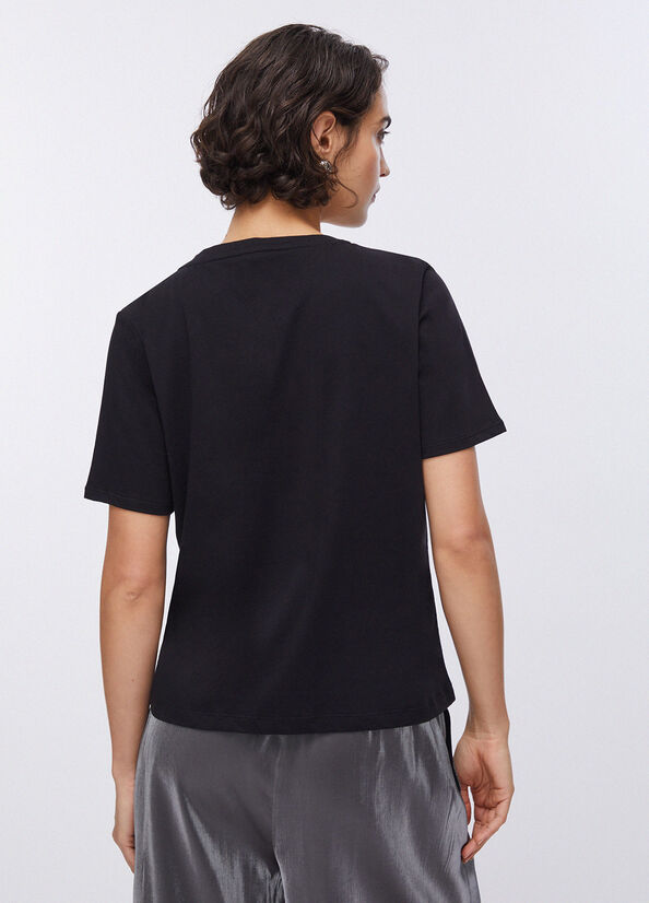 T-shirt con applicazioni