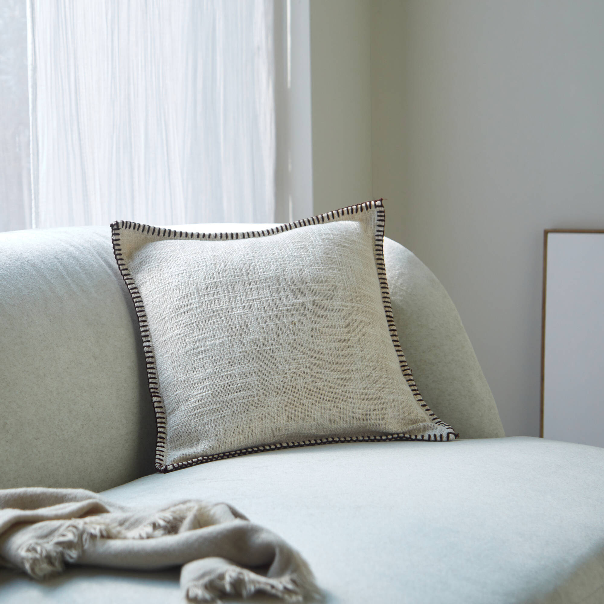 Coussin uni coton texturé