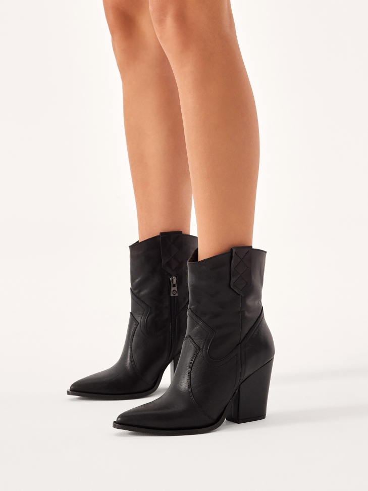 Black leather heeled cowboy boots