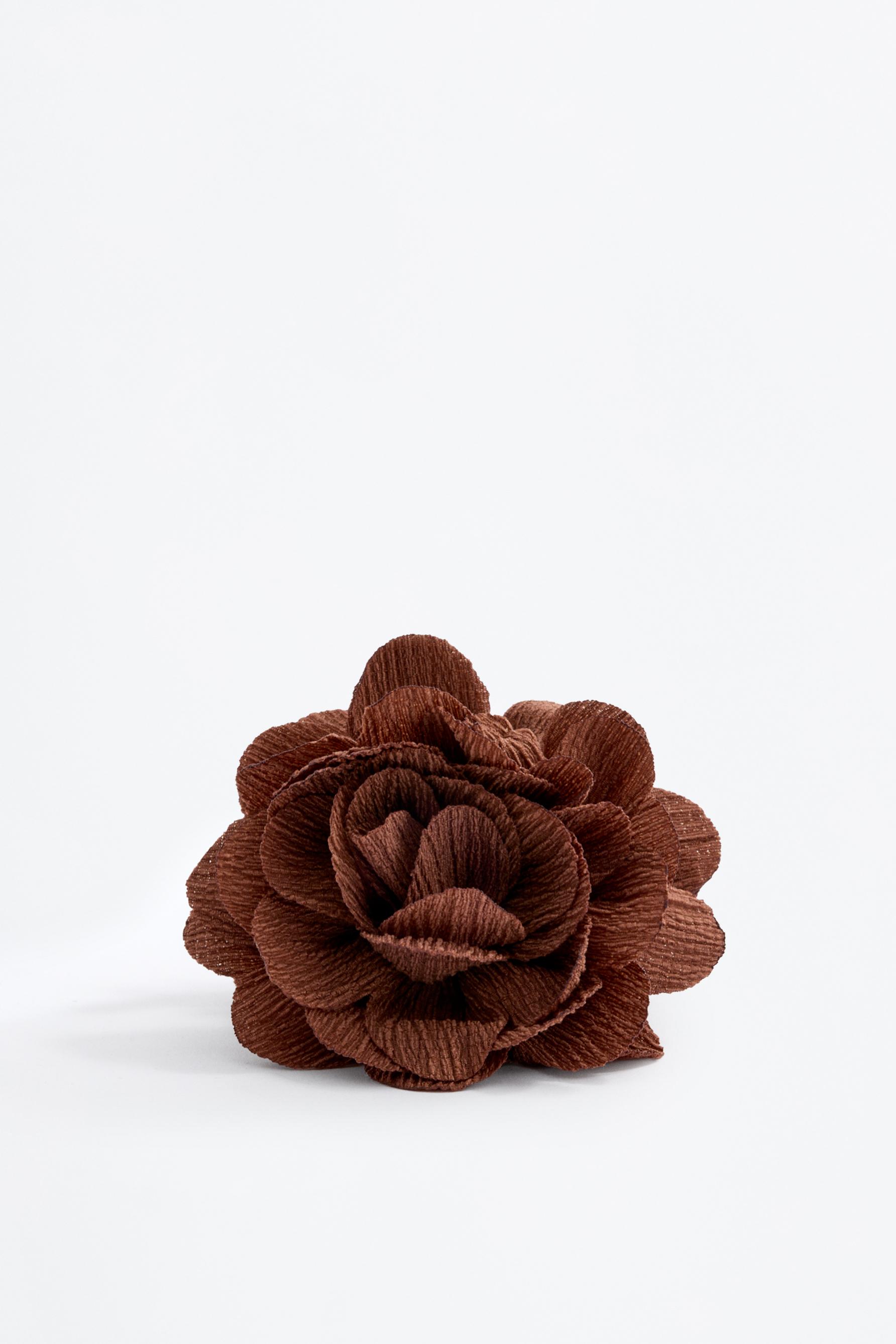 Pinza flor pelo