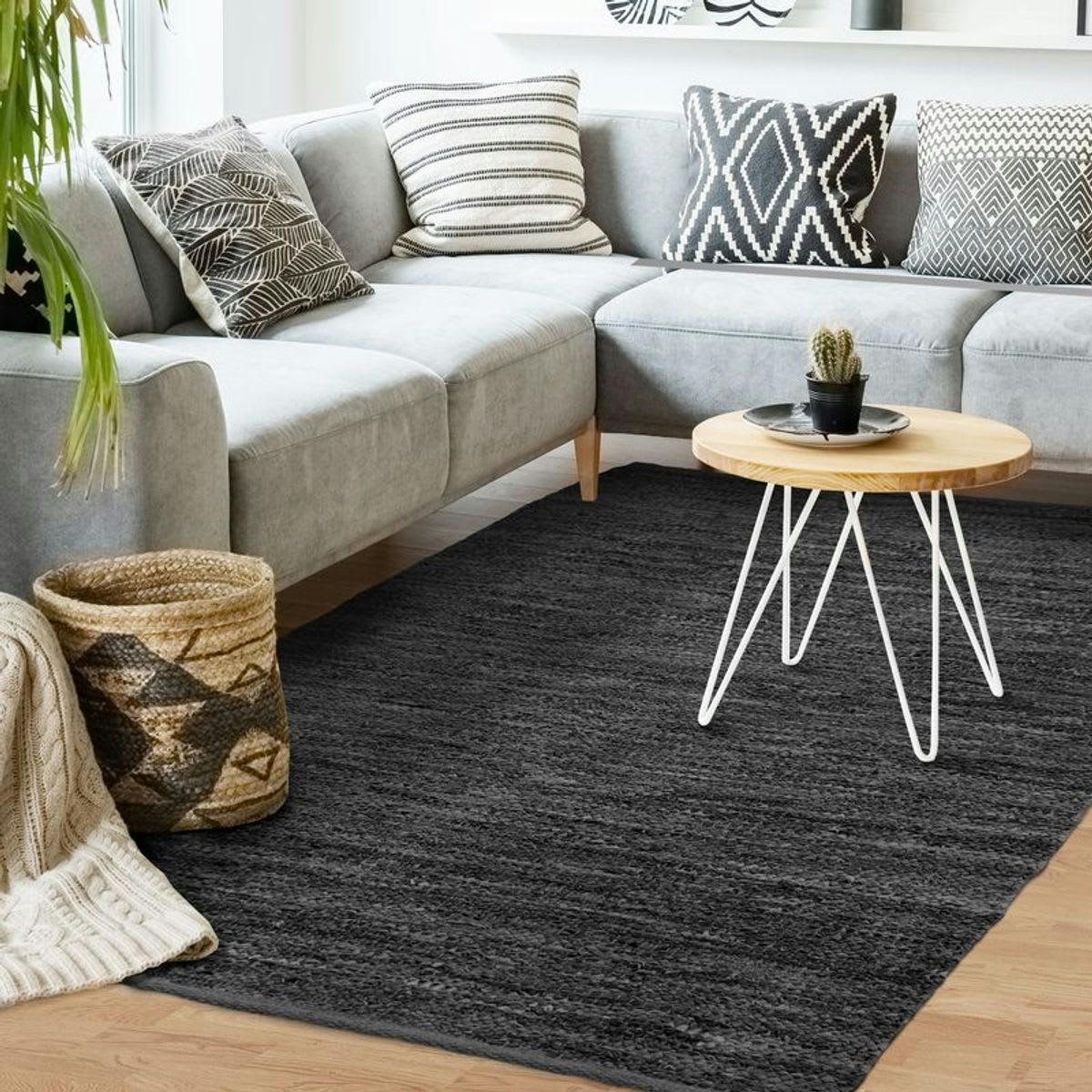 SKIN - Tapis en cuir tressé noir 160x230