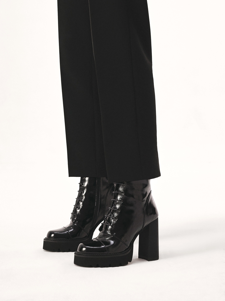 Patent leather boots with high heel and track sole