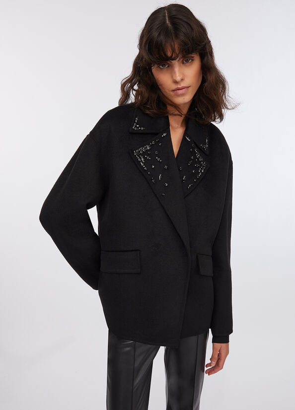 Cappotto in lana con ricami gioiello
