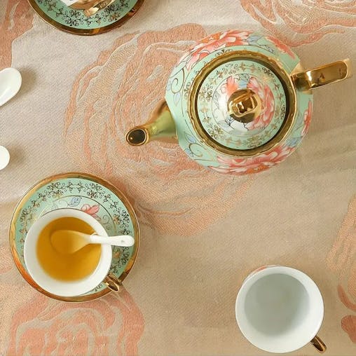 NNETM Green Elegance in Bloom: 20-Piece Ceramic Tea and Coffee Set with Iron Rack