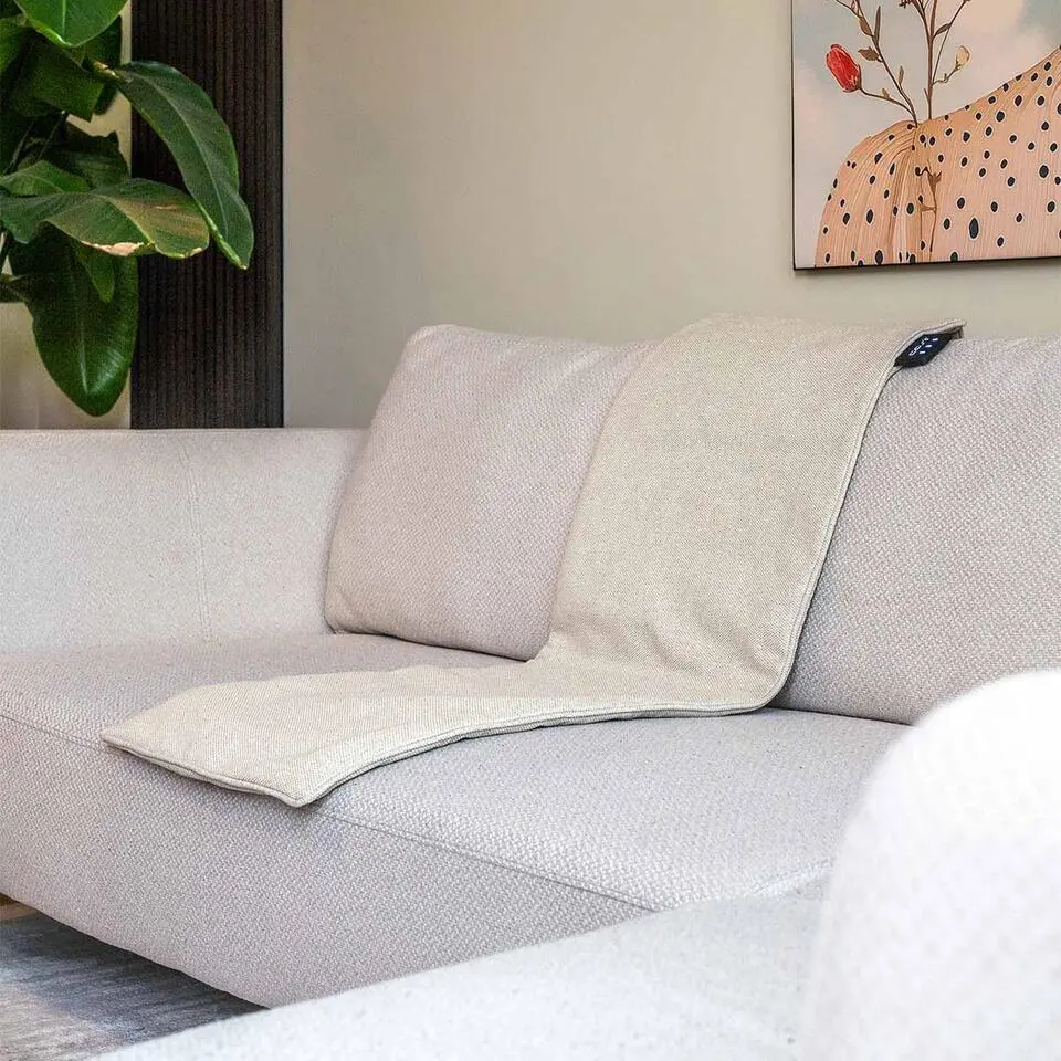 Cosi Fires Cosiseat Lite warmte stoelkussen 110x45 cm - teddy beige