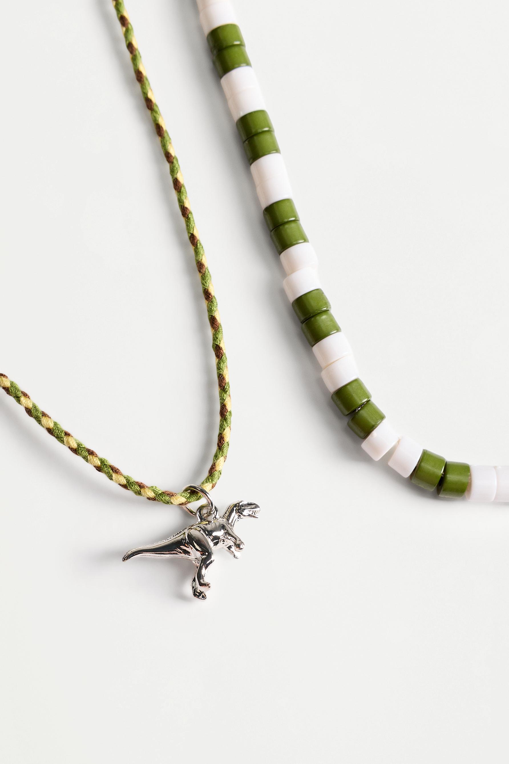 Collar doble dinosaurio