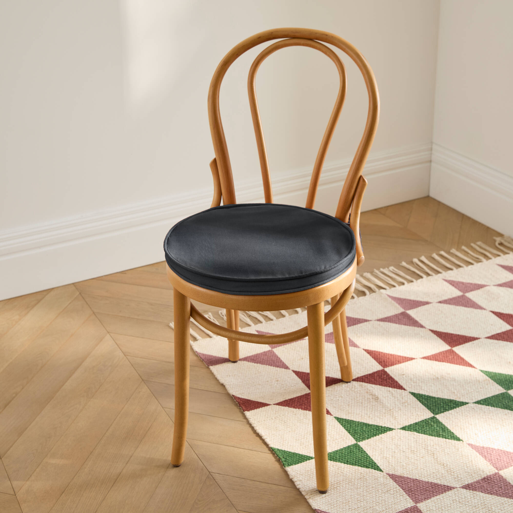 Coussin d'assise uni rond bachette