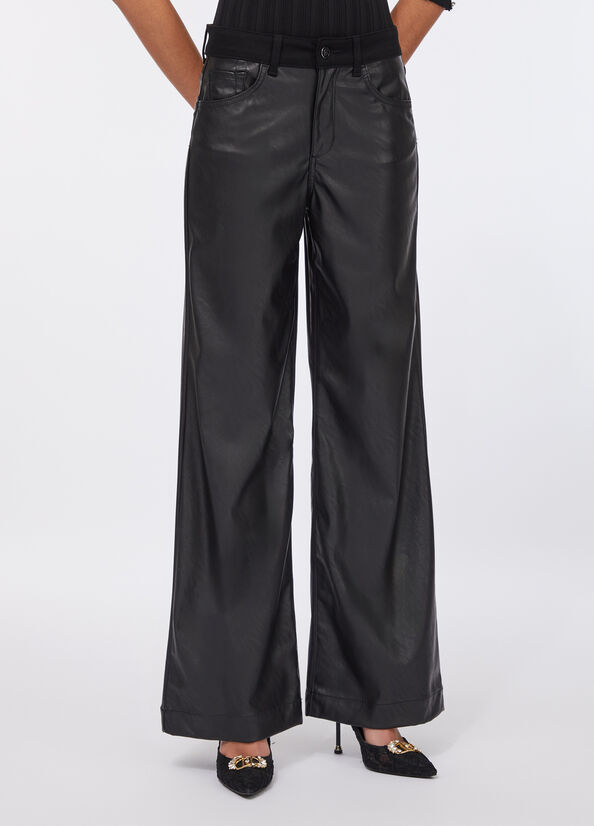 Pantaloni flare in tessuto spalmato