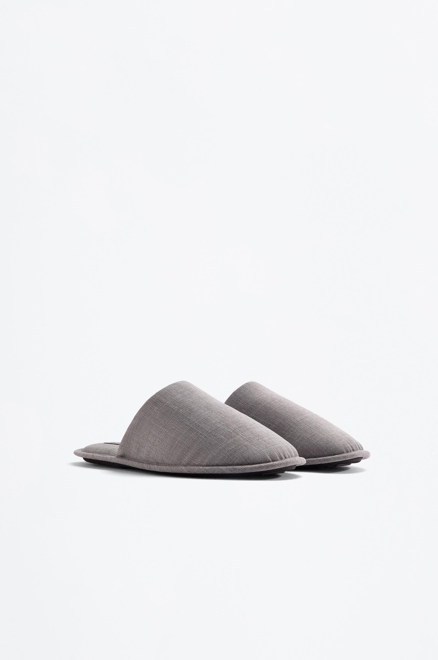 Zapatilla de casa tejido
