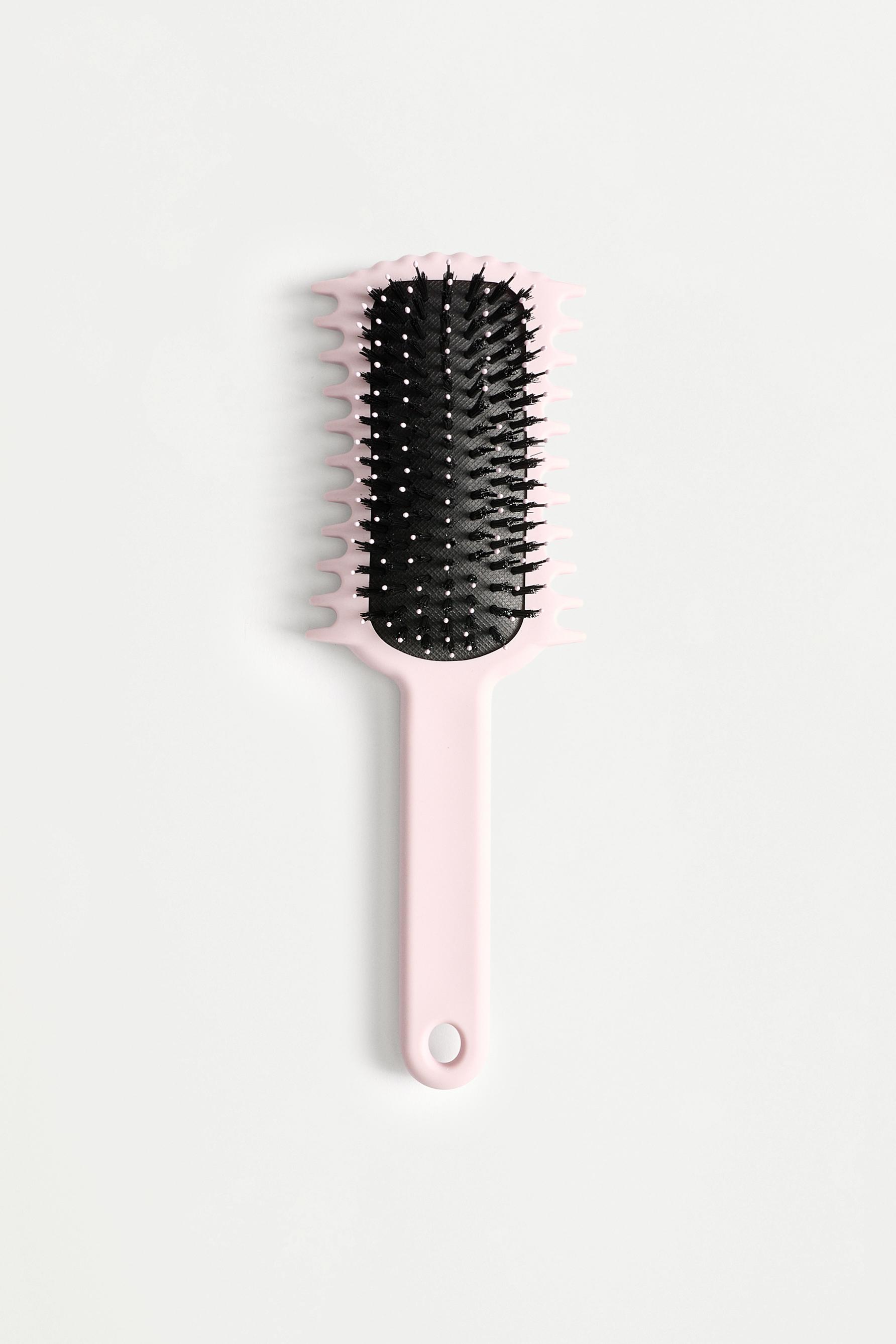 Cepillo pelo rizado
