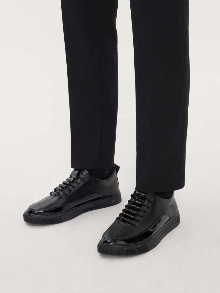 Men’s black leather sneakers with elegant inserts