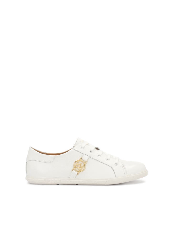 White leather sneakers decorated with a monogram
