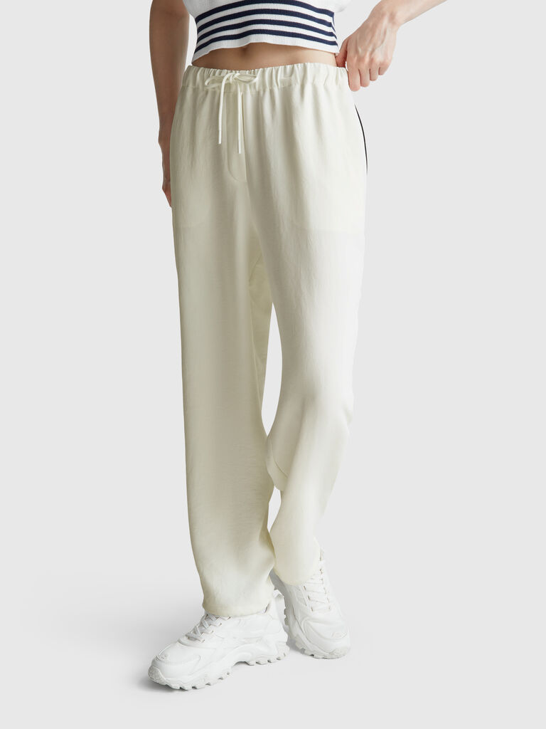 Trousers with elastic and drawstring