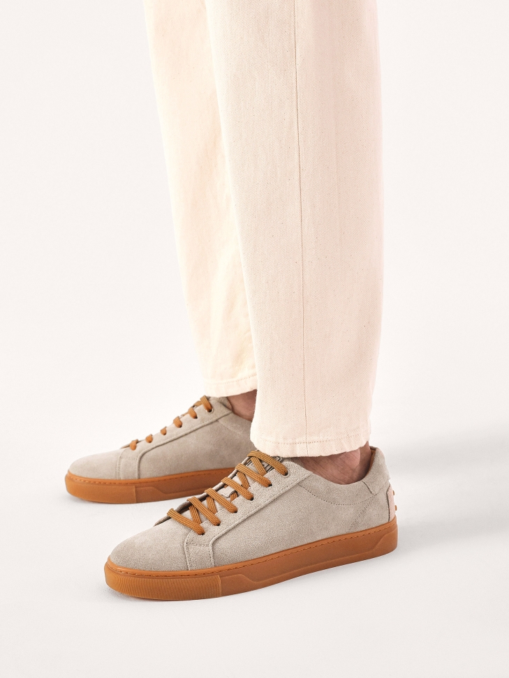 Taupe suede sneakers with brown accessories