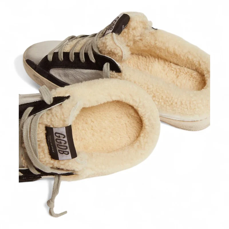 The Super-Star Sabot in silver laminated leather with a black star