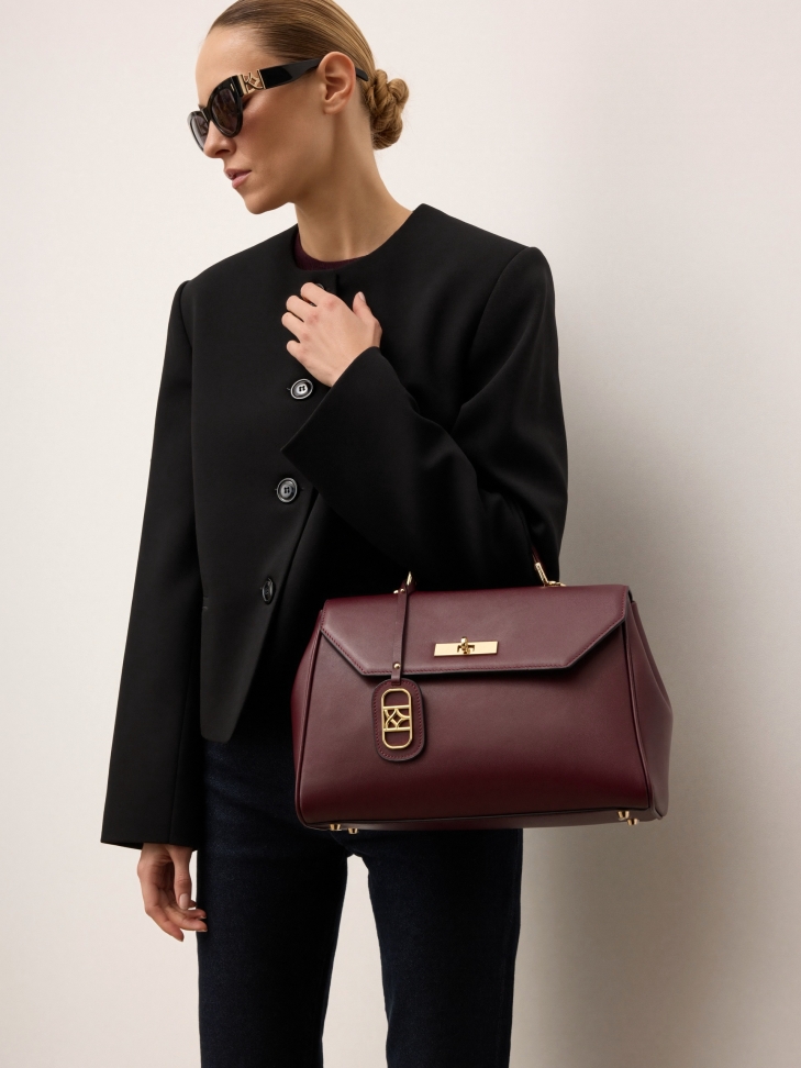 Maroon elegant leather handbag