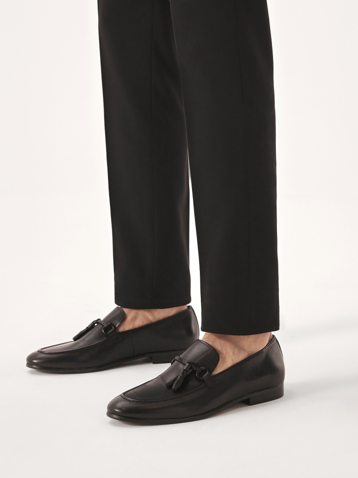 Black loafers with tassel