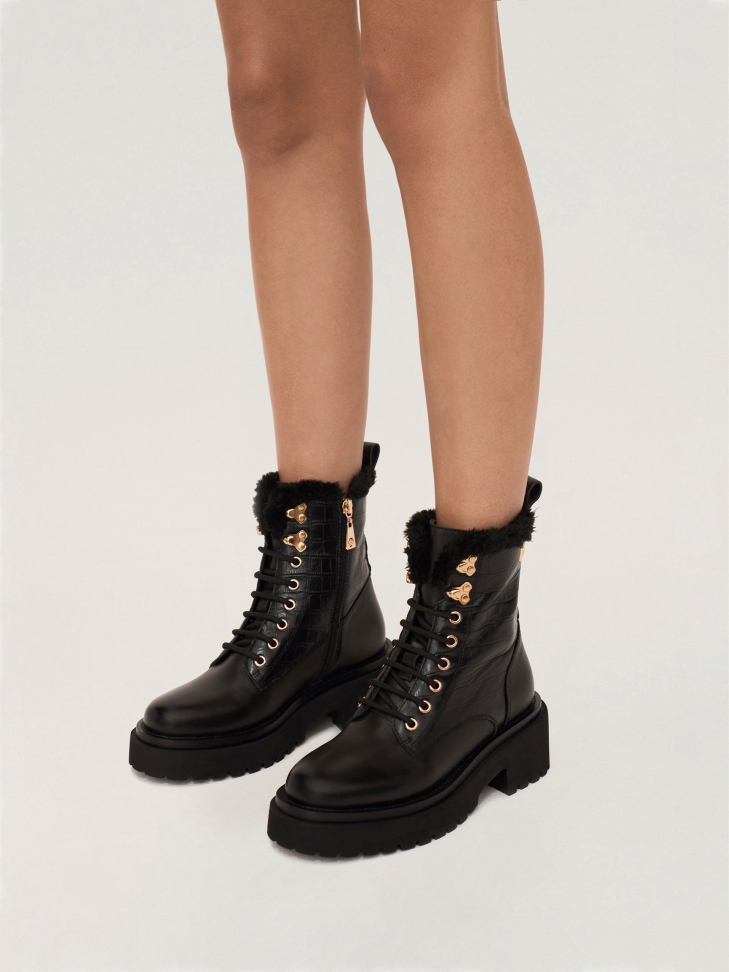 Women's insulated boots in embossed and smooth leather