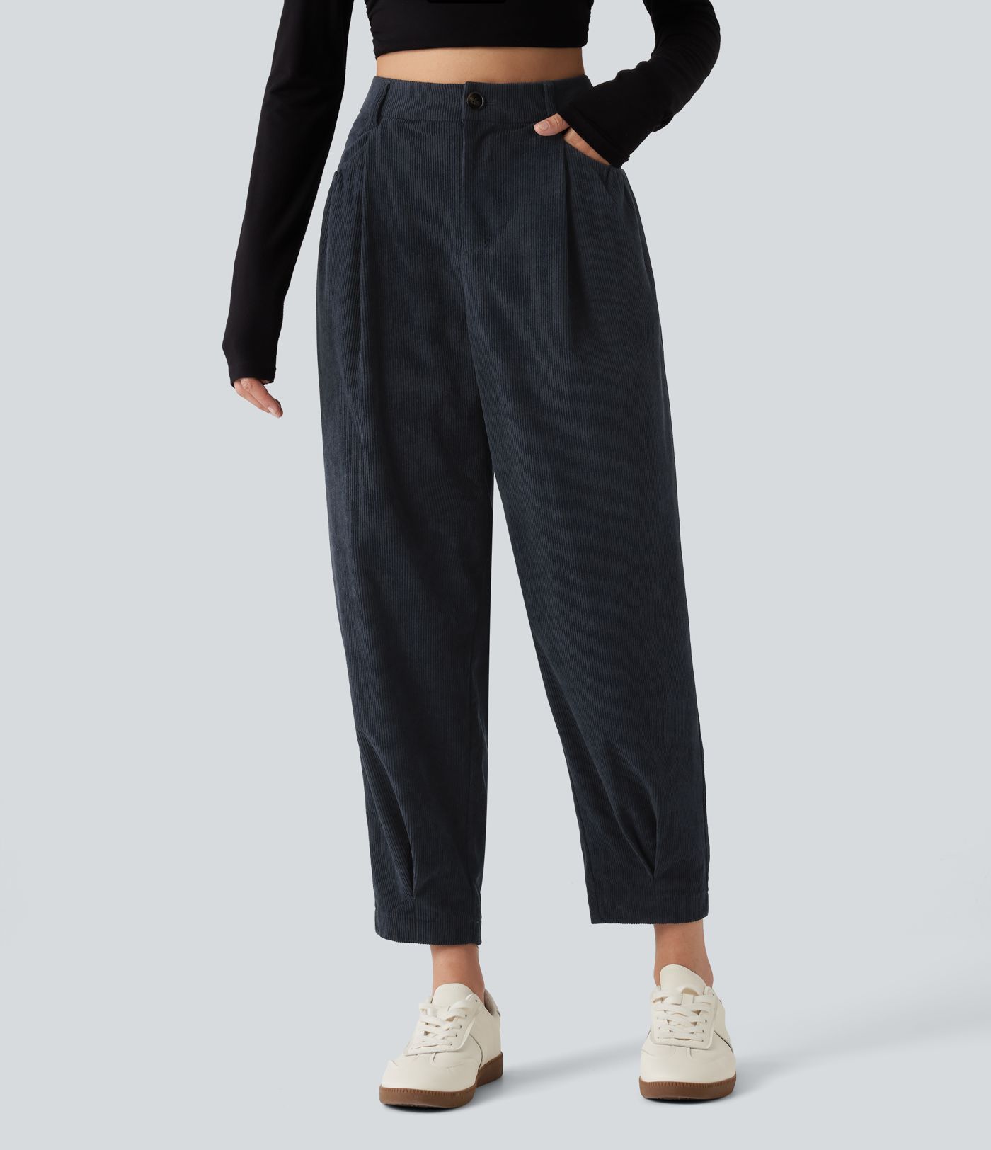 Pantalon en velours côtelé taille haute coupe fuselée avec poches