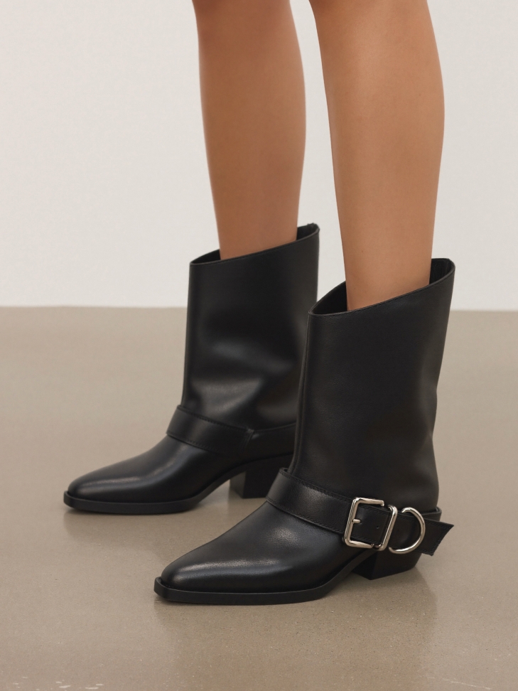 Leather boots in cowboy style