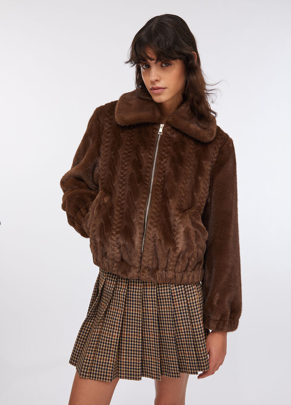 Bomber in teddy con trecce