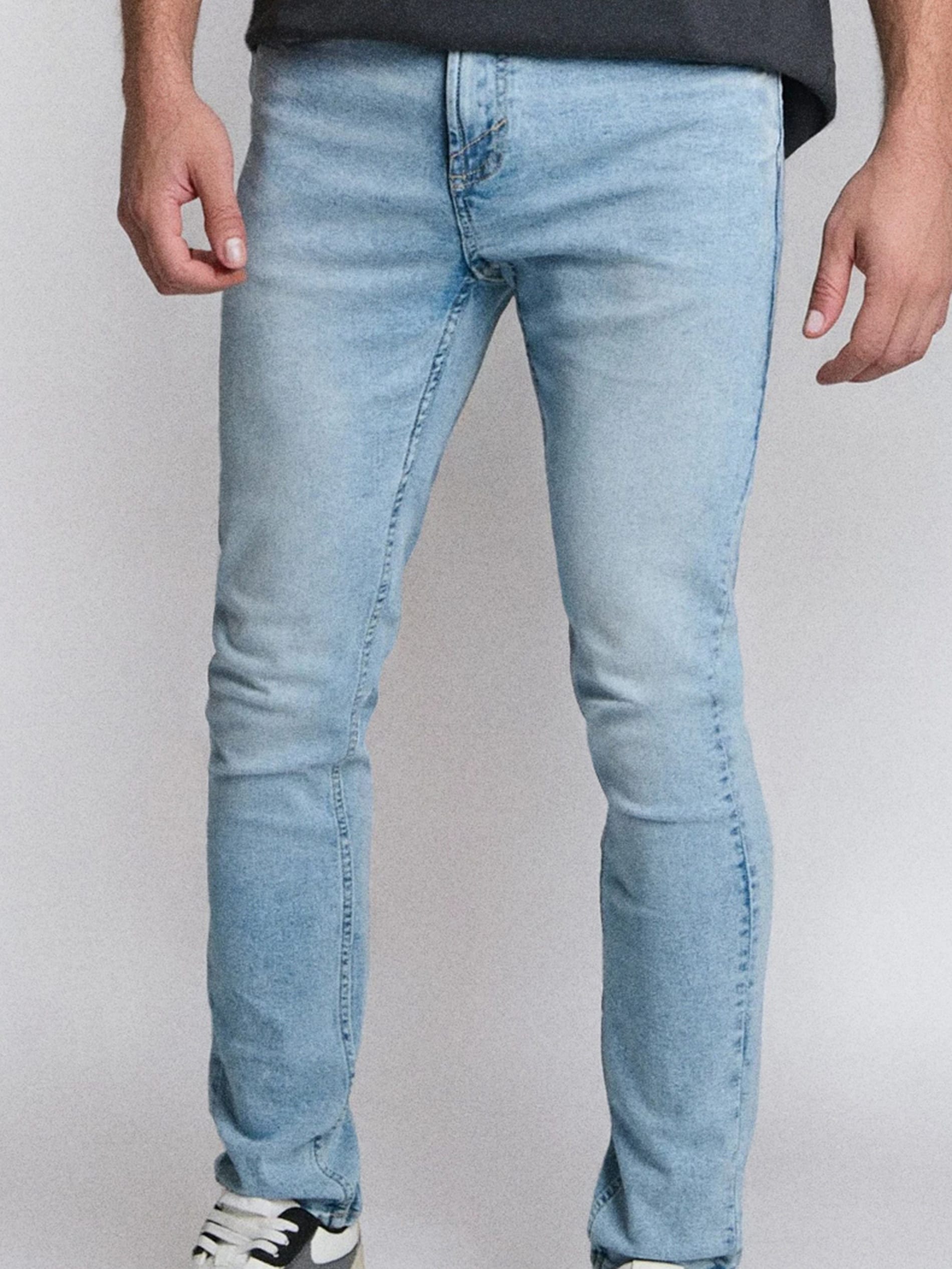 Jeansy skinny z efektem sprania