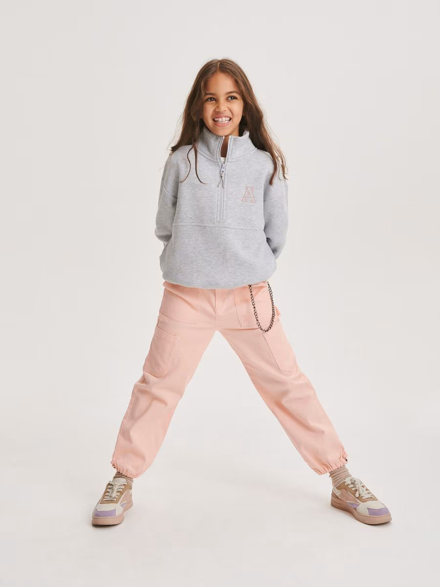 Trousers With Chain Detail
