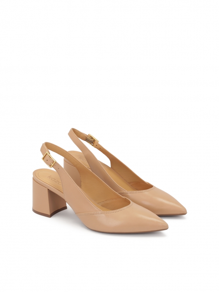 Beige pumps on a comfortable post