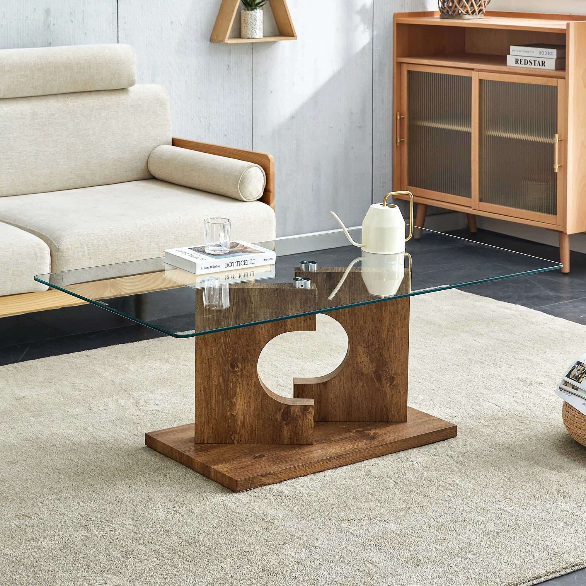 A rectangular modern and fashionable coffee table with tempered glass tabletop and MDF legs