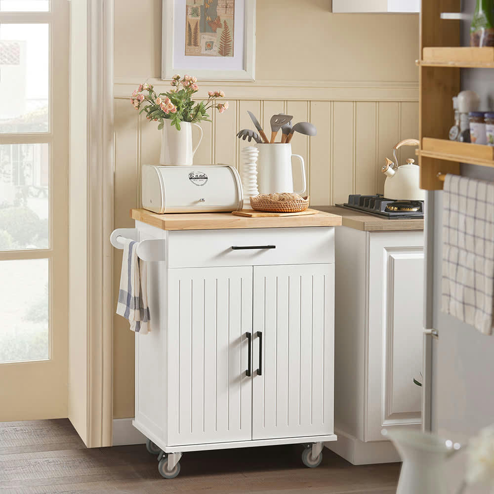 - Desserte effet bois blanc  à roulettes 1 tiroir 2 portes