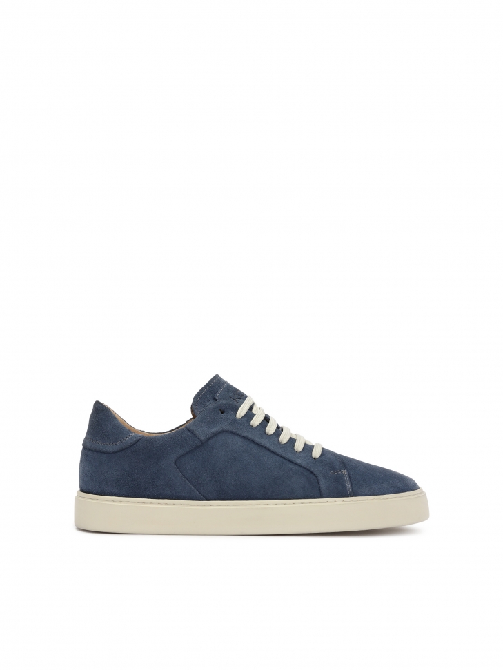 Navy blue sneakers on a white sole