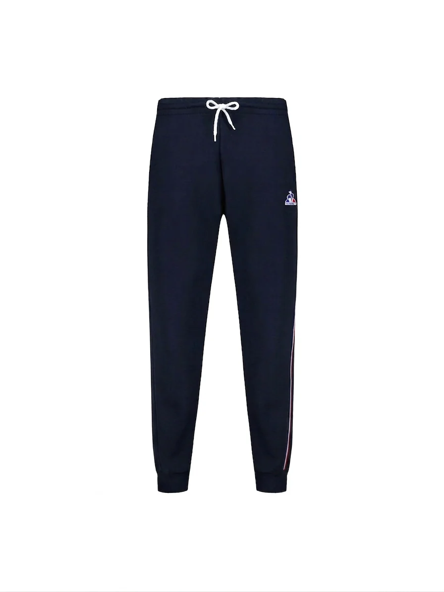 Pantalon double face avec bande tricolore