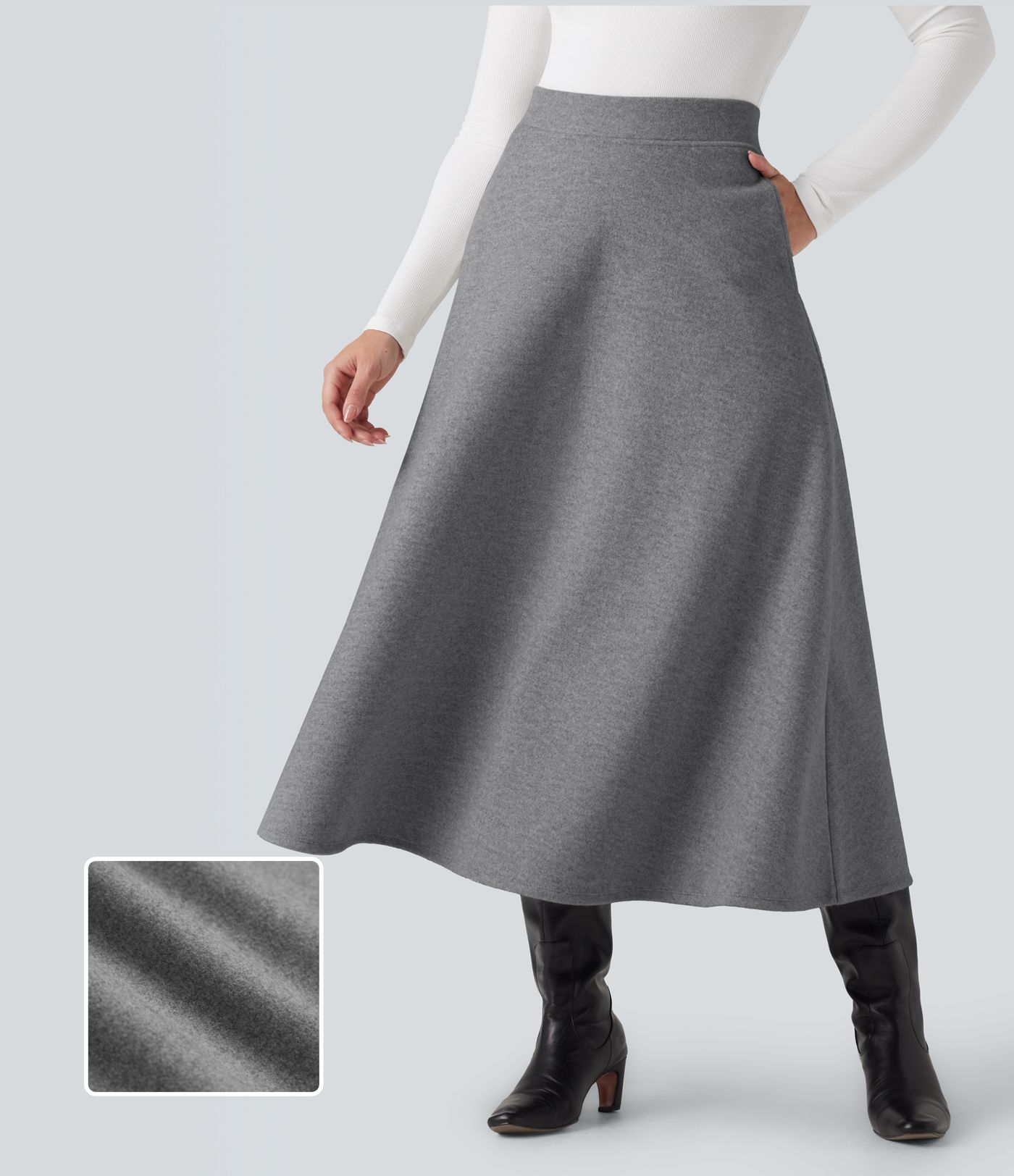 Jupe mi-longue évasée polaire taille haute avec poches