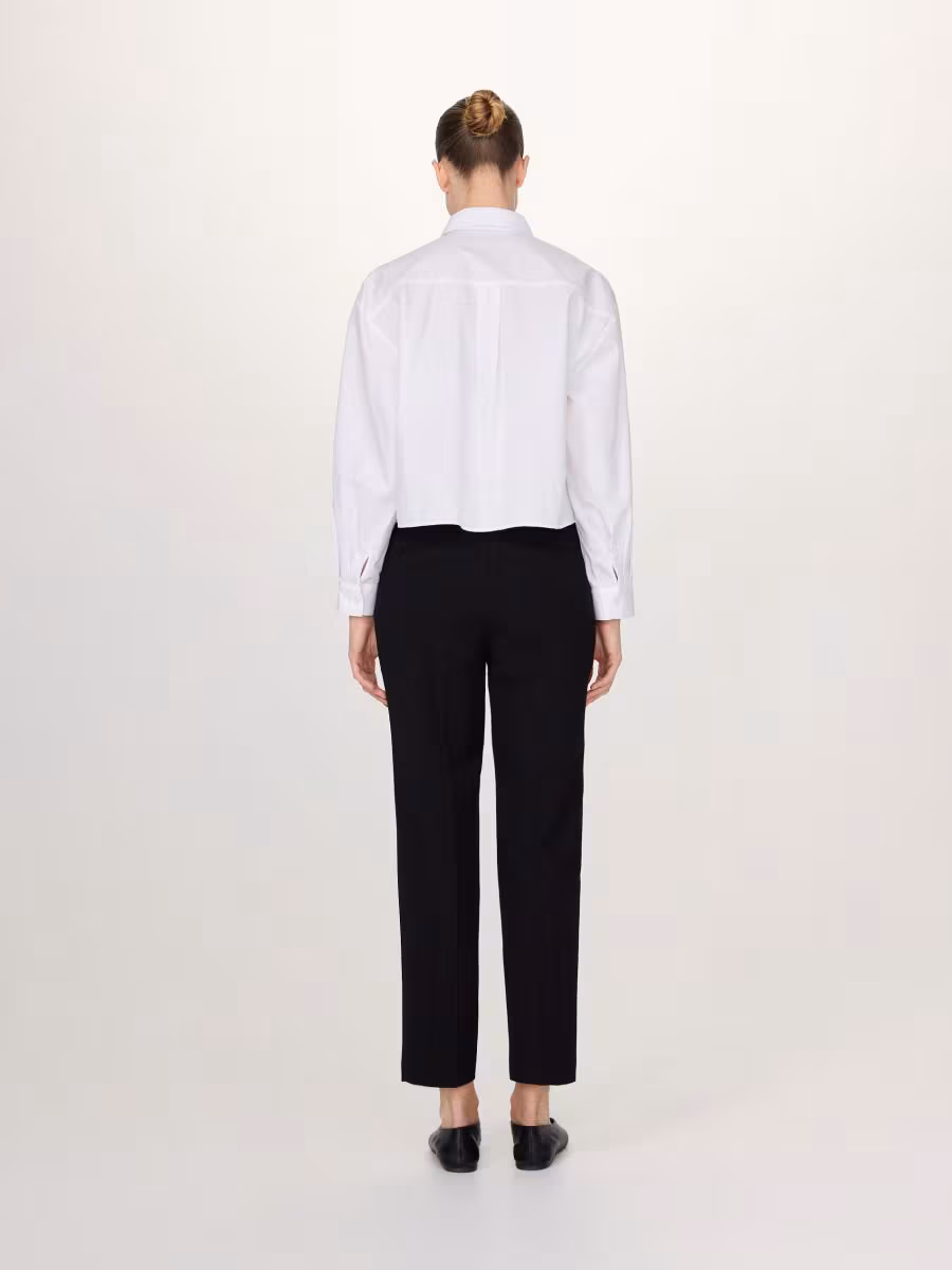 Trousers With Asymmetrical Zipping