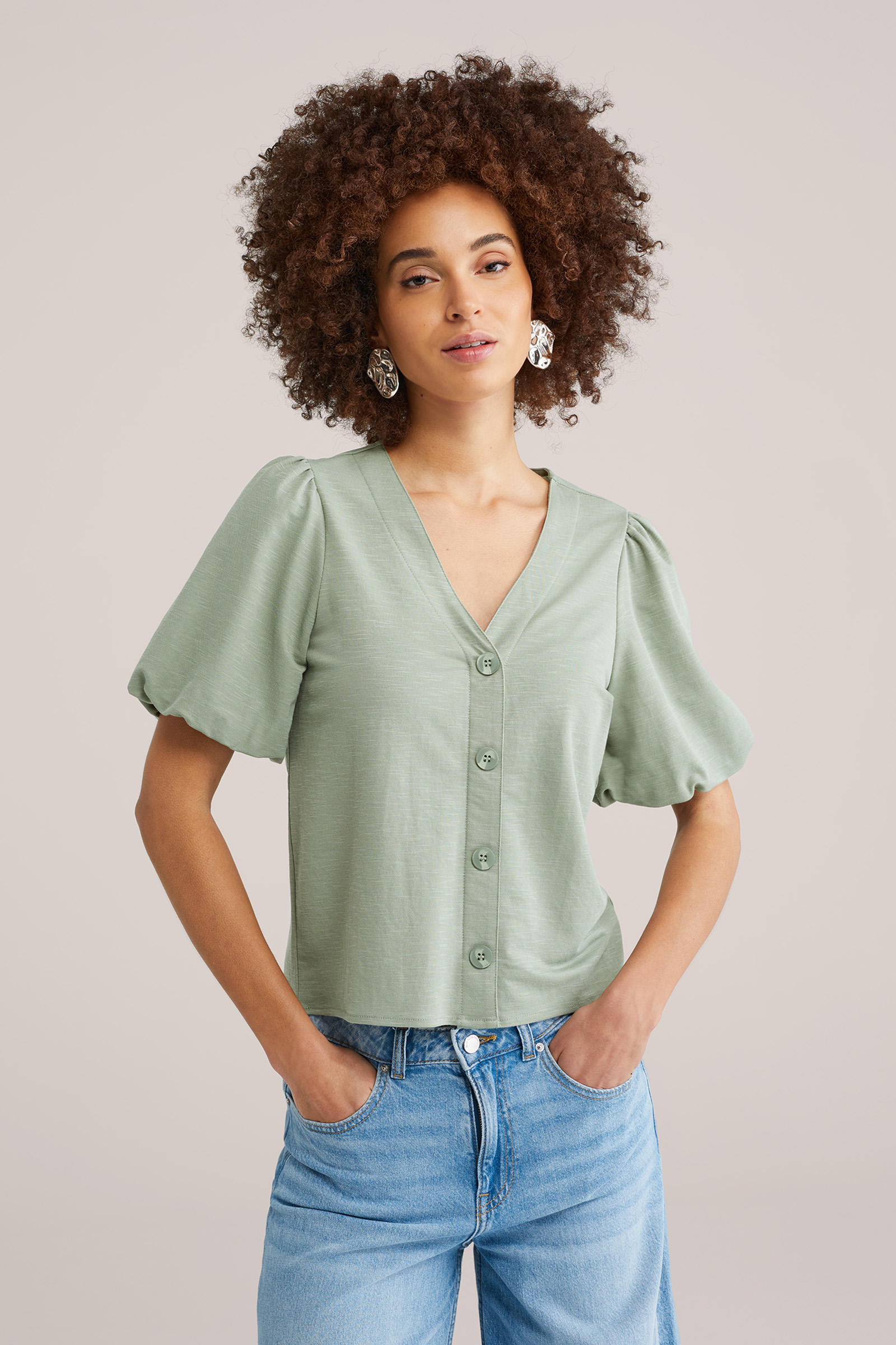 Dames jersey top met ballonmouwen