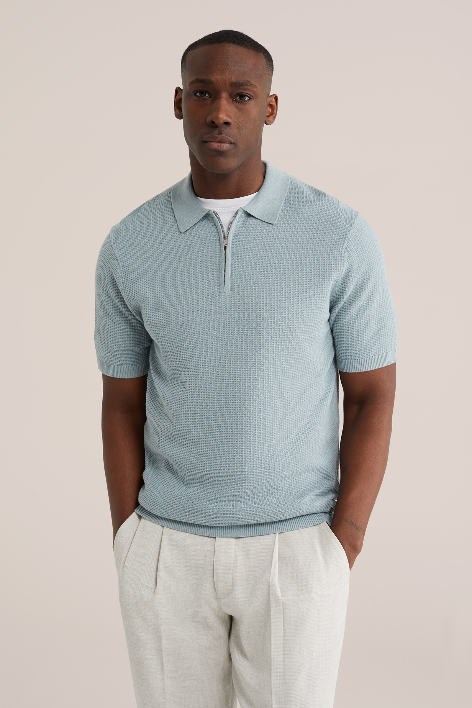 Heren regular fit polo met quarter-zip en structuur