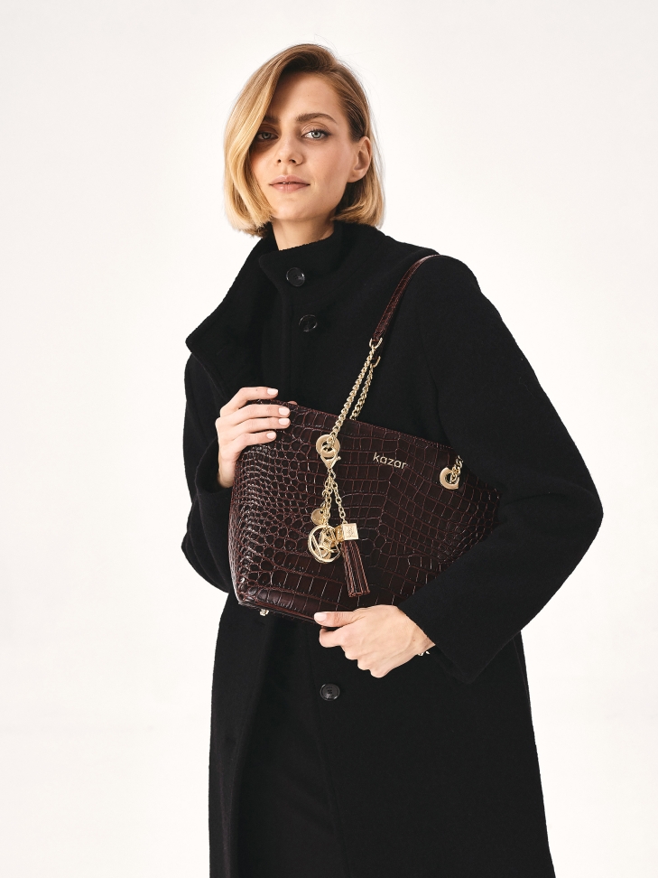 Maroon glossy embossed leather handbag