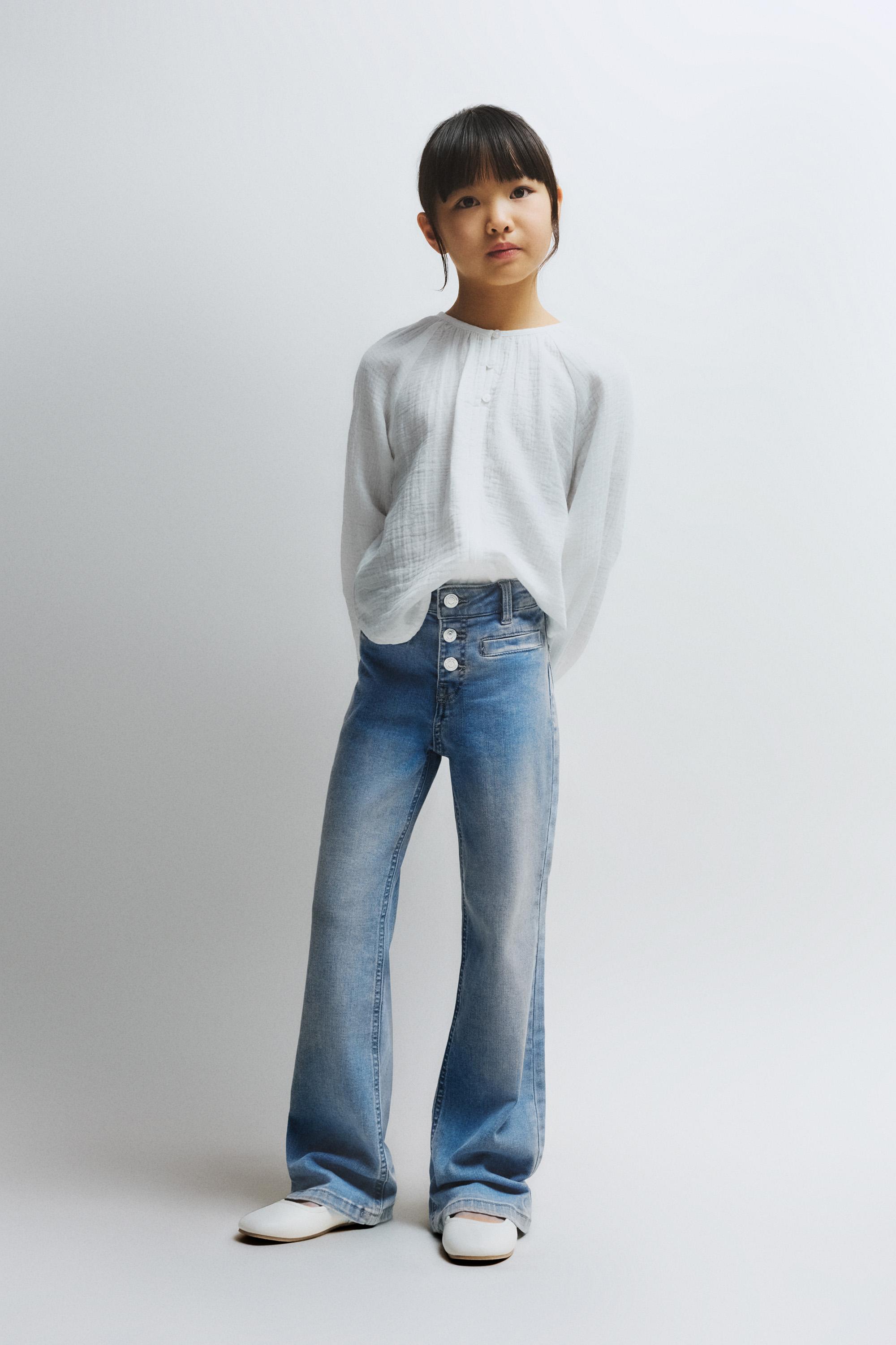 Jeans flare botones