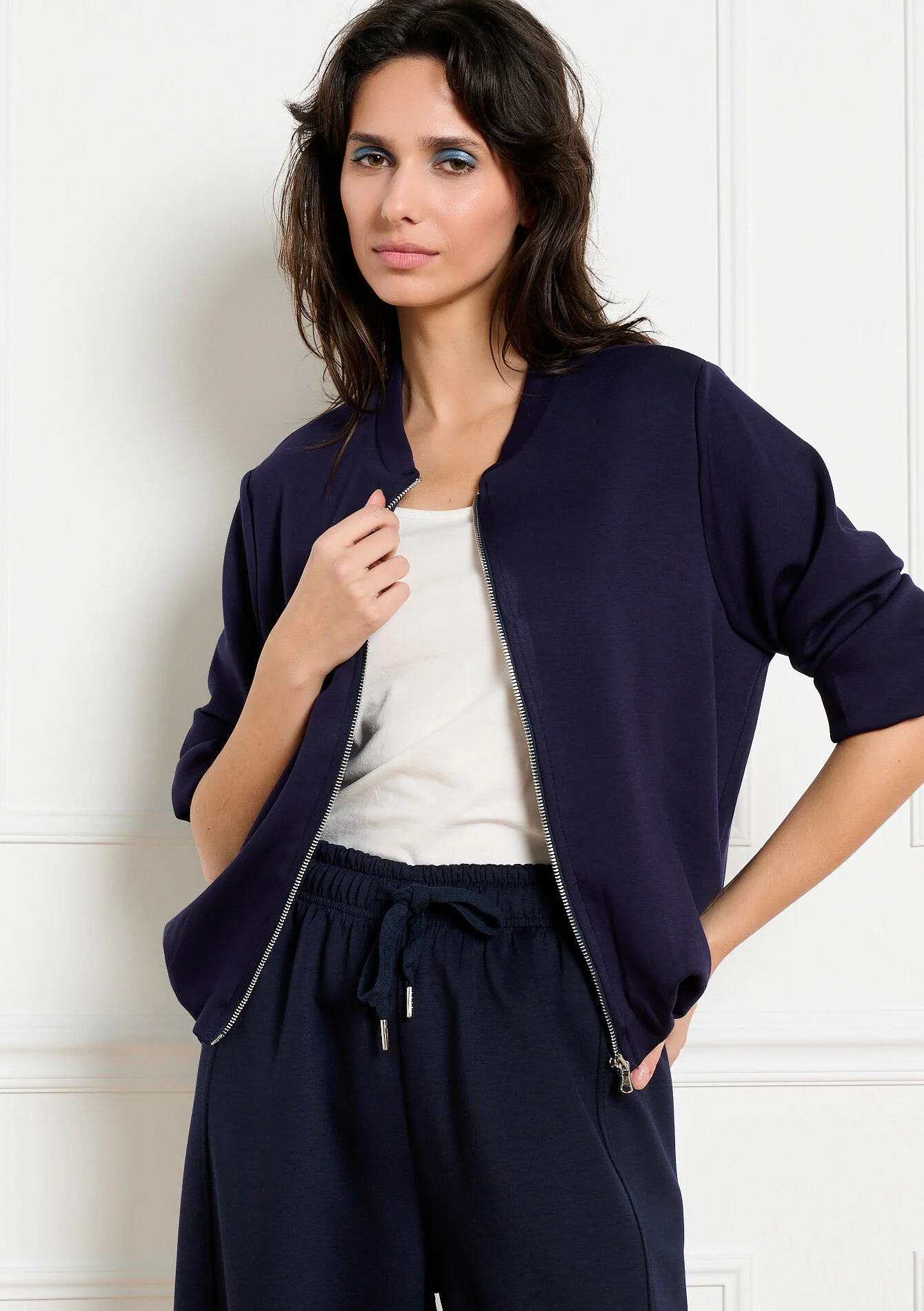 Soepele jas met rits