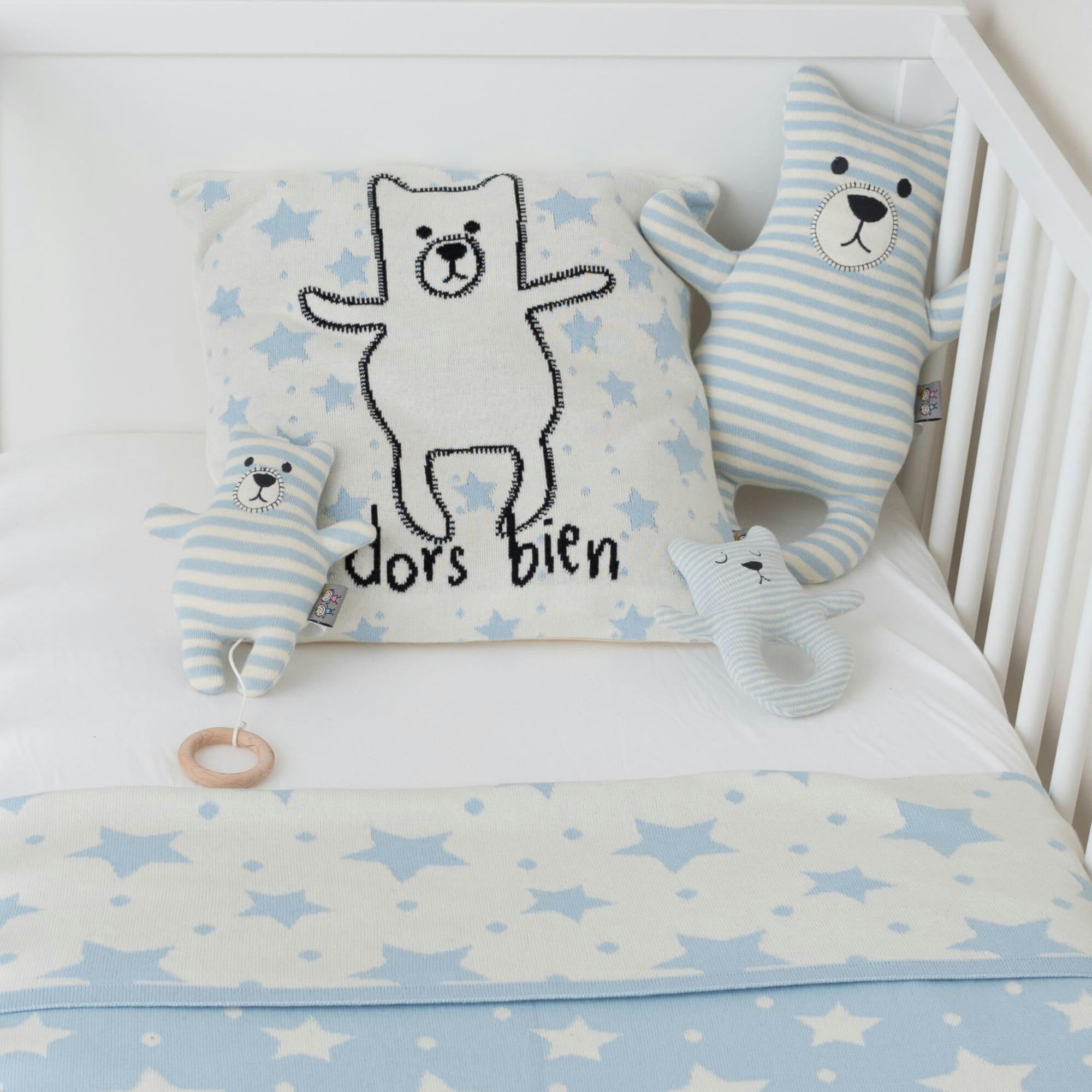 - Peluche musicale à suspendre en tricot  Ourson
