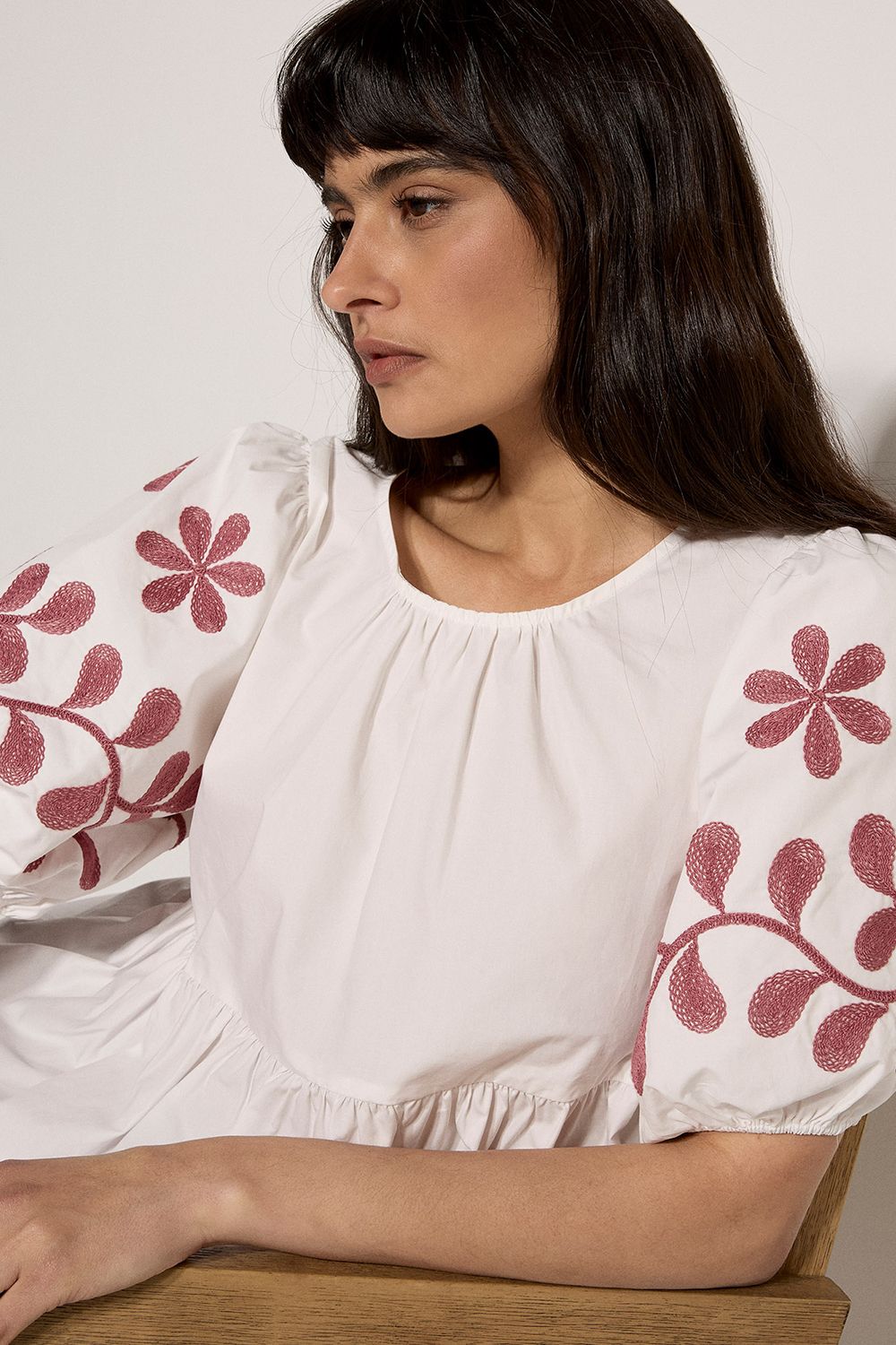 Apricot Floral Embroidered Peplum Cotton Top