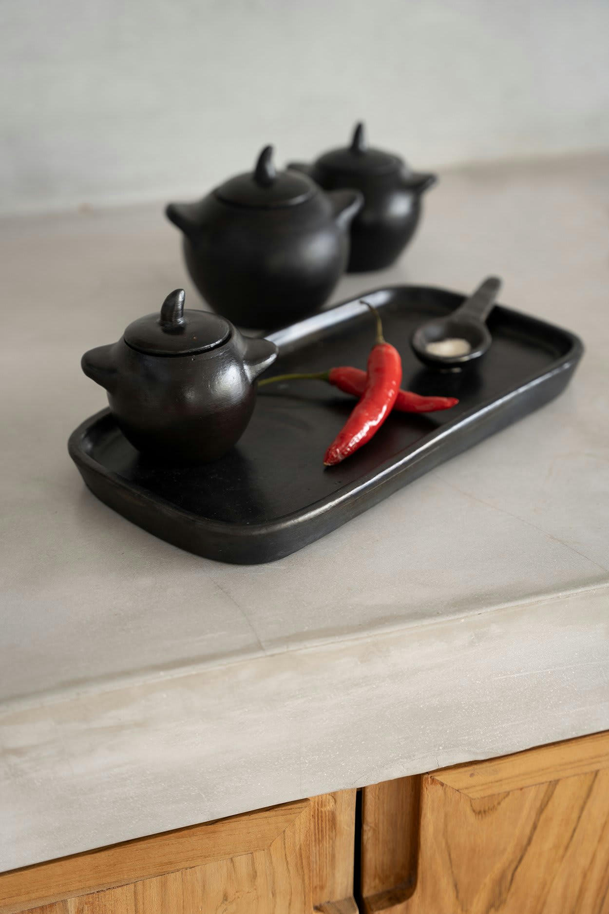 BURNED - Assiette à tapas en terracotta noir